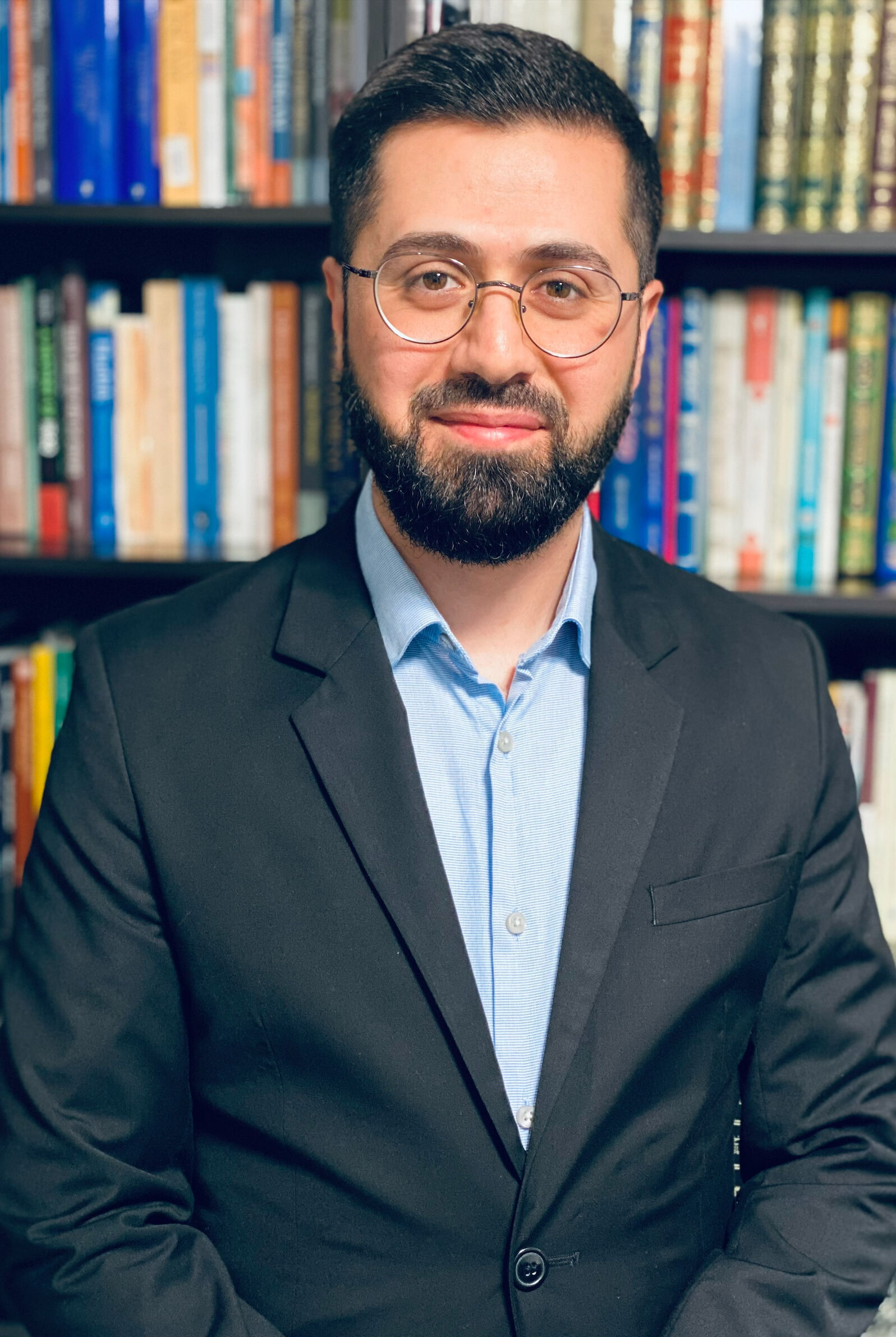 headshot of Hadi Qazwini